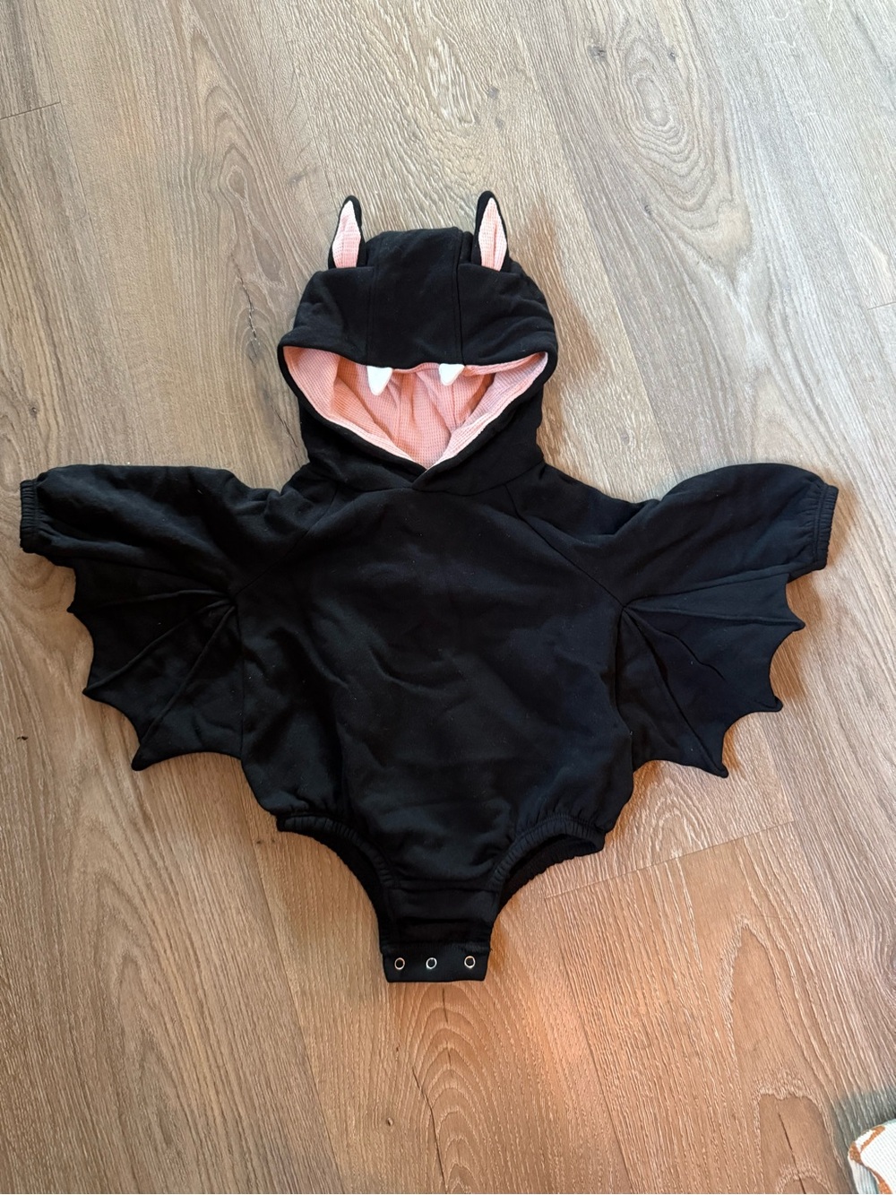 Old Navy Black Bat Hoodie Bodysuit with Pink Lining